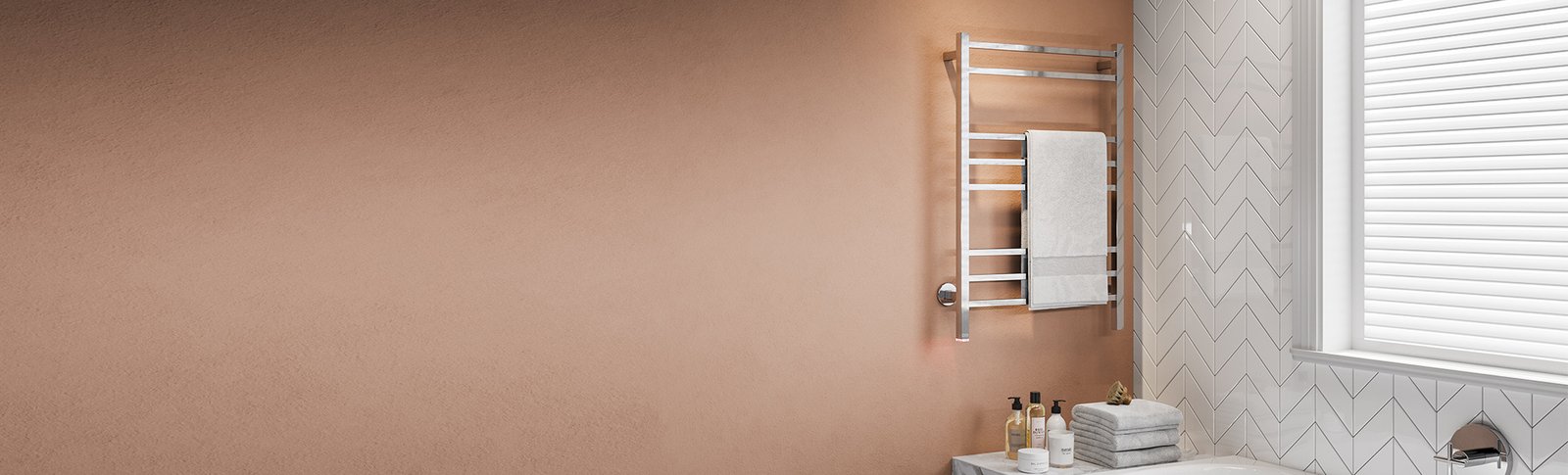 Cubic 8 Bar heated towel rail with temperature control installed at end of bath